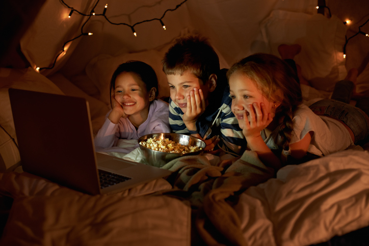 Children in a blanket fort