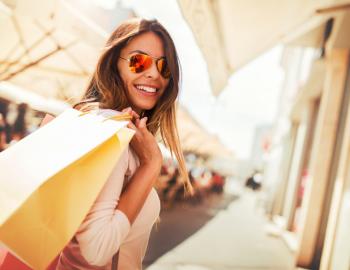 A woman shops at the Tanger Outlets in Foley, AL