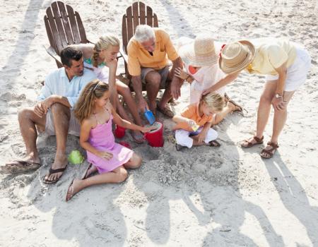 A family at the beach in Gulf Shores, Alabama