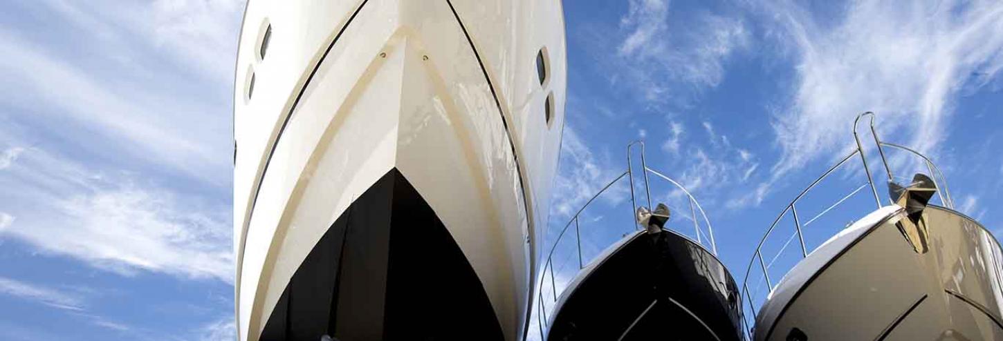 Boats lined up outside at a boat show