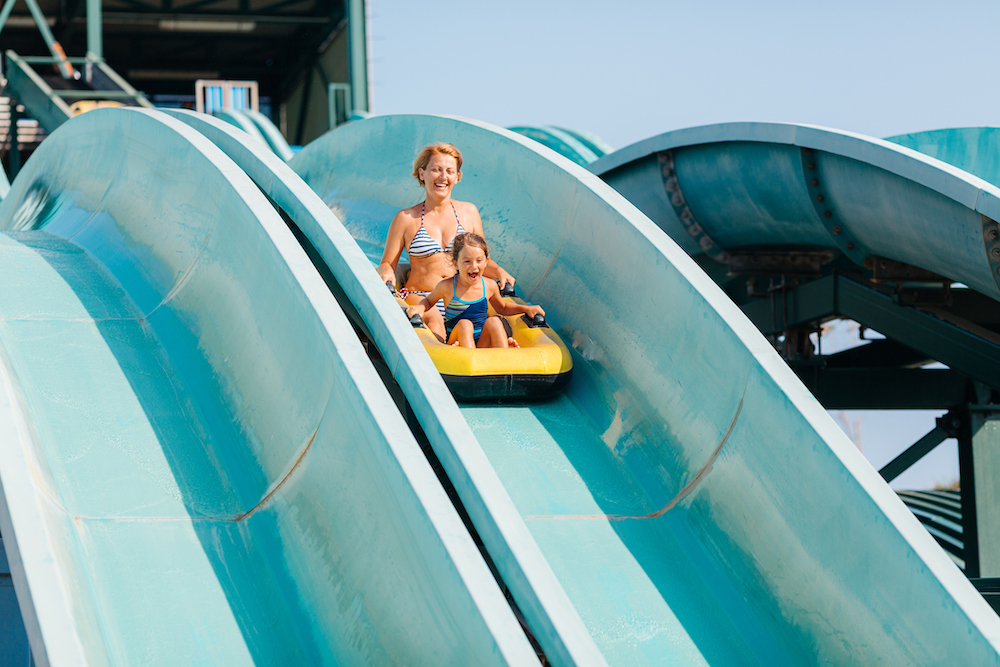 Family using a water slide