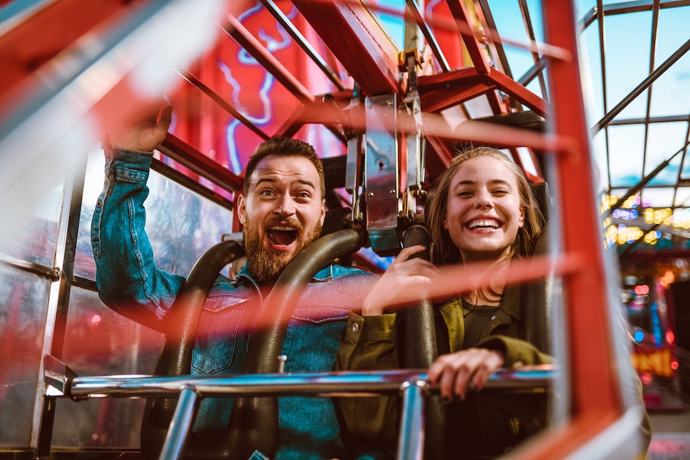 People on a roller coaster ride.